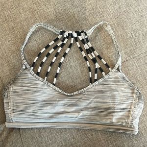 Lululemon sports bra. Size 8, has white, black and grey detail